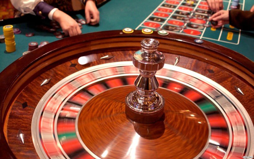 kota mobile app interface showing slots and sportsbook categories
